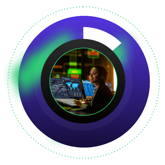 Woman working on several computers with green and purple circle textures around photo